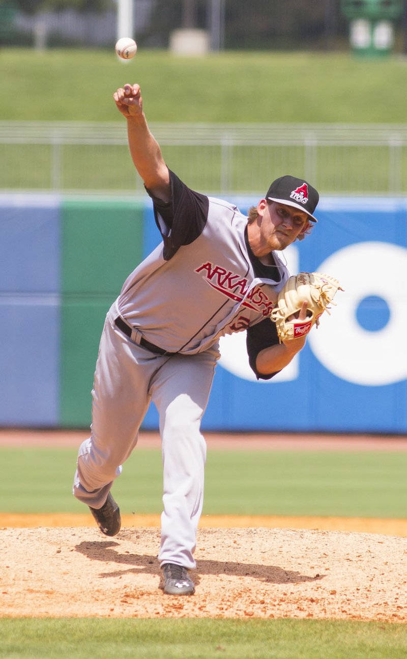 Arkansas’ Tyler Carpenter pitches against the Northwest Arkansas Naturals on Sunday at Arvest Ballpark in Springdale.