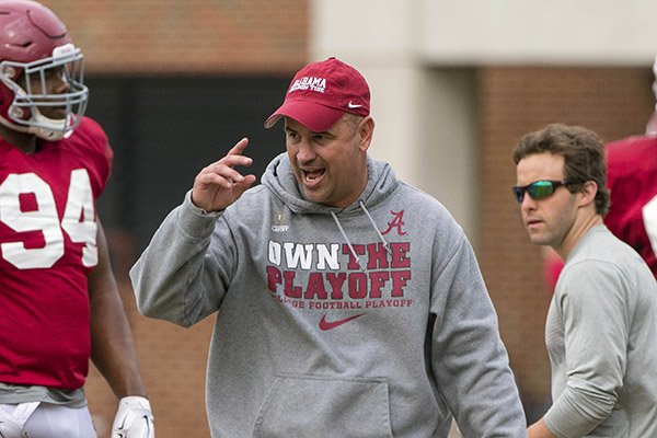 In this April 6, 2016 file photo, Alabama defensive coordinator Jeremy Pruitt works with his players during football practice at the Thomas-Drew Practice Fields in Tuscaloosa, Ala. (Vasha Hunt/AL.com via AP)