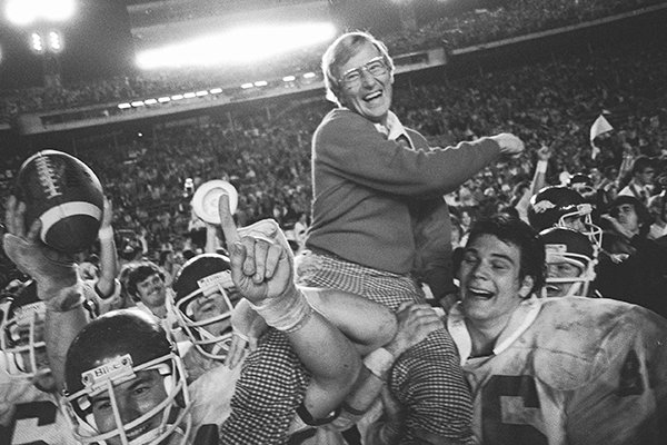 Arkansas coach Lou Holtz is carried by his players after defeating Oklahoma at the Orange Bowl in Miami, in this Jan. 2, 1978 photo. (AP Photo/Phil Sandlin)