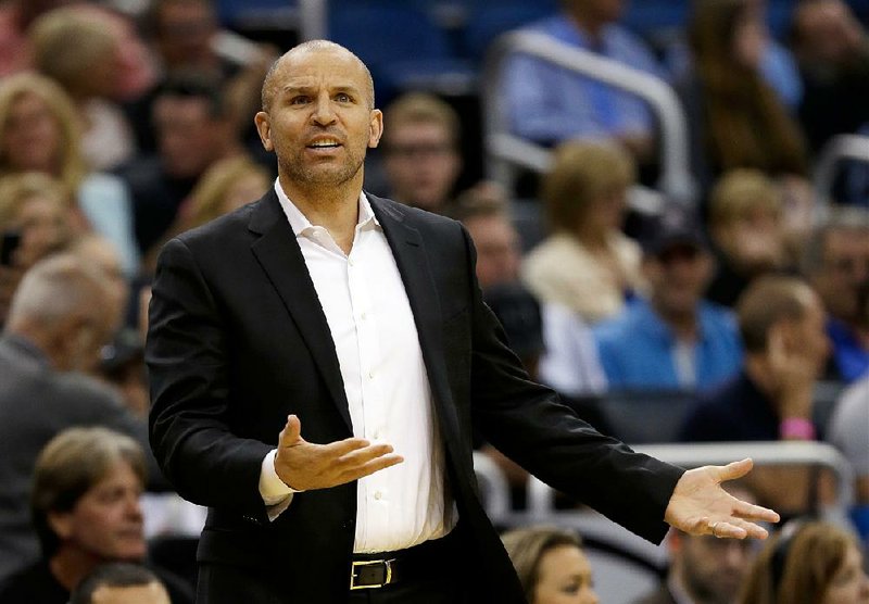 In this April 11, 2016, file photo, Milwaukee Bucks coach Jason Kidd questions a call by an official during an NBA basketball game against the Orlando Magic in Orlando, Fla. The Bucks have signed Kidd to a three-year contract extension. 