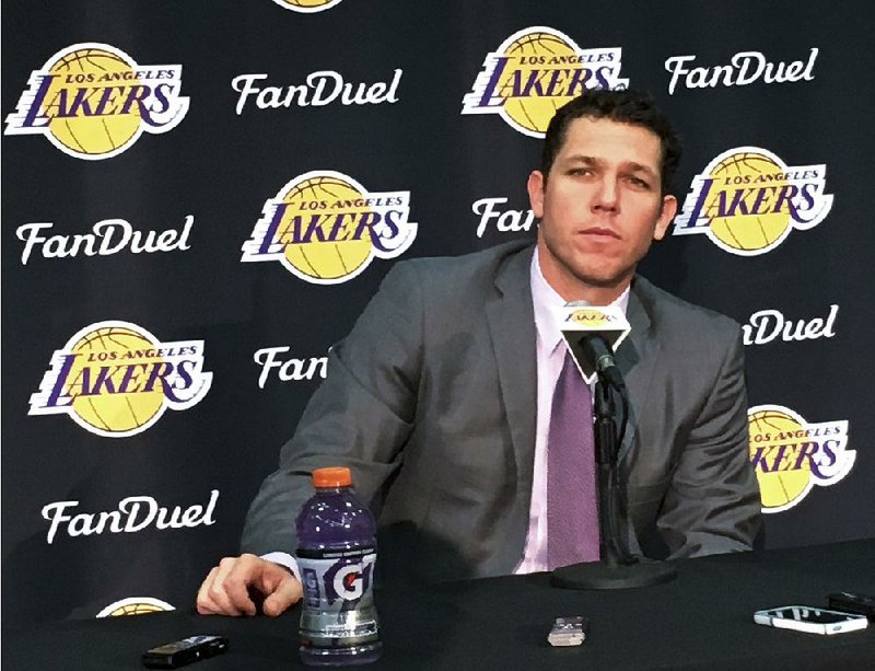 Luke Walton was formally introduced as the Los Angeles Lakers’ coach Tuesday and said the team is “in an exciting time” with talented young players and money to spend in free agency. 
