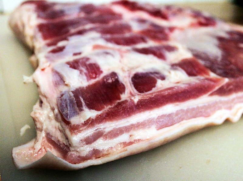 Pork belly — the fatty belly meat of a swine — is available at most butcher shops.