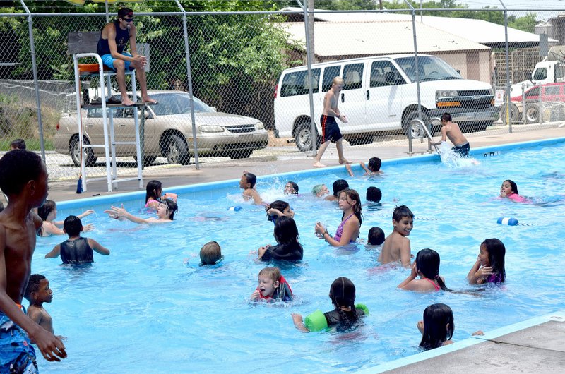 Photo by Mike Eckels Students of the Decatur Summer program take to the Decatur city pool to beat the heat June 17. The pool formal reopening occurred June 13, following several months of renovations.