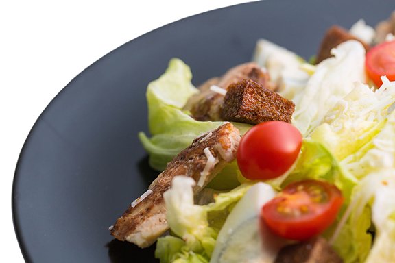 Instead of cubed croutons, try using thinly sliced croutons to accompany your Caesar salad.