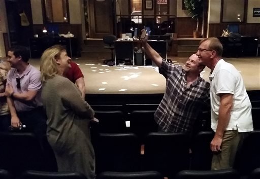 As Stacy Sells, second from left, looks on, entertainer Jason Alexander, second from right, takes a selfie with Tim Gauger after a preview show of “Windfall” at the Arkansas Repertory Theatre on Sunday, June 5, 2016, in Little Rock.