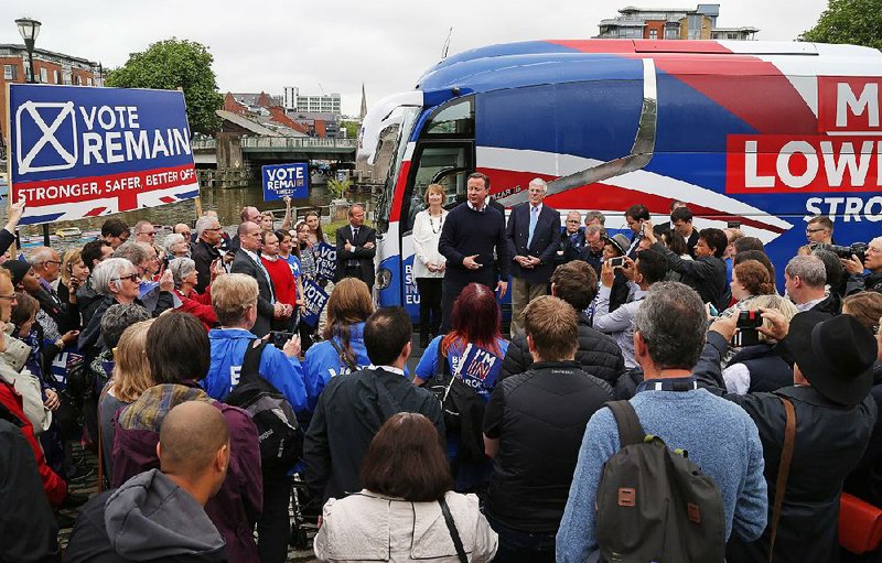 At a rally Wednesday in Bristol, England, British Prime Minister David Cameron (center) makes a final plea for his country to remain in the European Union. With Cameron is former Prime Minister John Major.