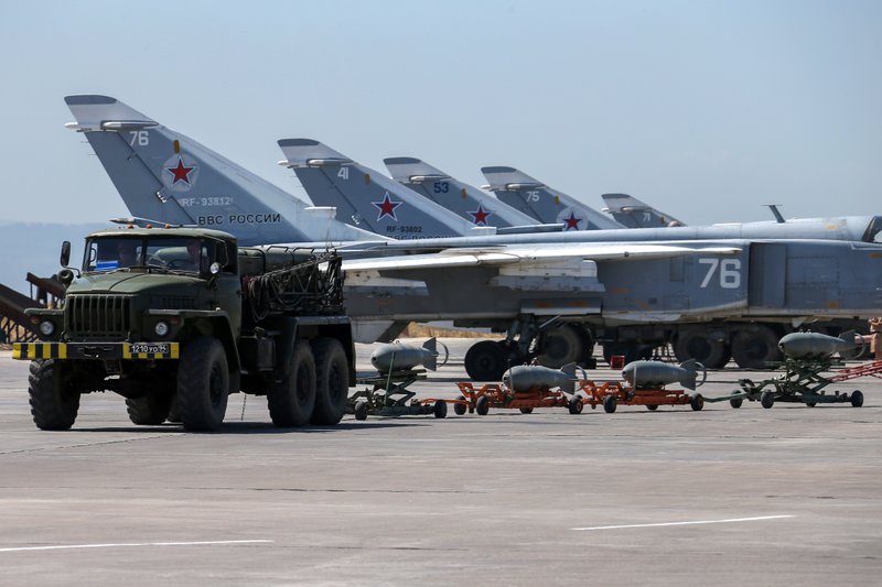 Activists say Russia, which has warplanes stationed at Hemeimeem air base in Syria, is partly to blame for airstrikes targeting Islamic State fighters that killed more than a dozen civilians this week. 