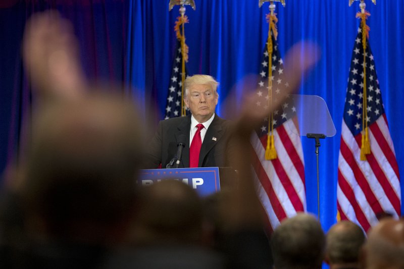 A supporter claps as Republican presidential candidate Donald Trump speaks in New York, Wednesday, June 22, 2016. 