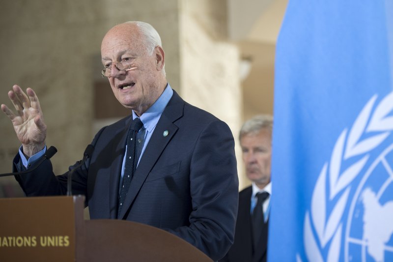 Staffan de Mistura, left, UN Special Envoy for Syria next to Jan Egeland, right, Senior Advisor to the United Nations Special Envoy for Syria, speaks about the International Syria Support Group's Humanitarian Access Task Force at the European headquarters of the United Nations, in Geneva, Switzerland, Thursday, June 23, 2016. 