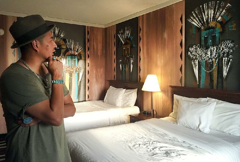 Painter Estella Loretto designed this guest room at Albuquerque’s Nativo Lodge. 