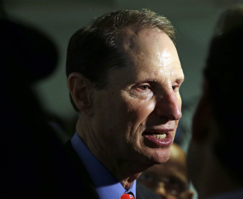 In this Friday, Sept. 25, 2015, file photo, U.S. Sen. Ron Wyden, D-Ore., speaks after a news conference in Portland, Ore. 