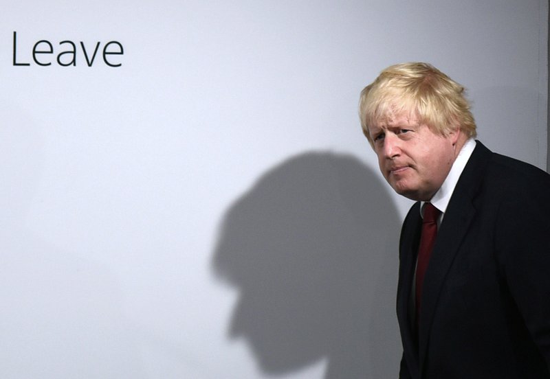 Vote Leave campaigner Boris Johnson arrives for a press conference at Vote Leave headquarters in London Friday June 24, 2016. Britain's Prime Minister David Cameron announced Friday that he will quit as Prime Minister following a defeat in the referendum which ended with a vote for Britain to leave the European Union. (Mary Turner/Pool via AP)