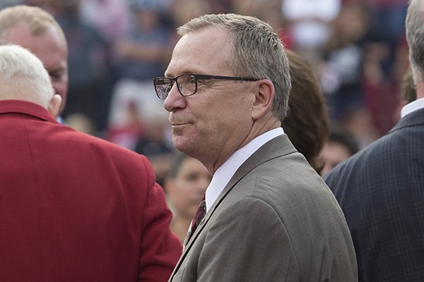 Arkansas athletics director Jeff Long awaits pregame festivities prior to a game against Texas Tech on Saturday, Sept. 19, 2015, at Razorback Stadium in Fayetteville. 