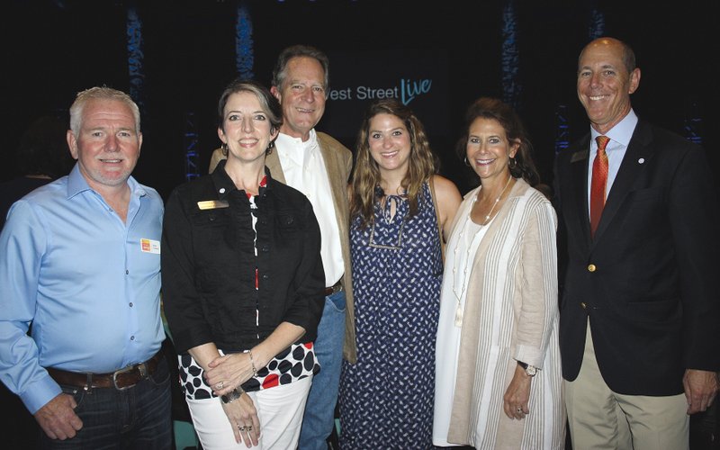 Brian Crowne (from left), Jennifer Ross, Neal Pendergraft, Sarah Ann Pendergraft, Gina Pendergraft and Peter Lane gather for a photo at a reception to announce the West Street Live Series presented by Neal Pendergraft on June 14 at the Walton Arts Center.