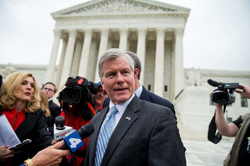 In this April 27 photo, former Virginia Gov. Bob McDonnell speaks outside the Supreme Court in Washington. On Monday the Supreme Court overturned McDonnell’s bribery conviction.