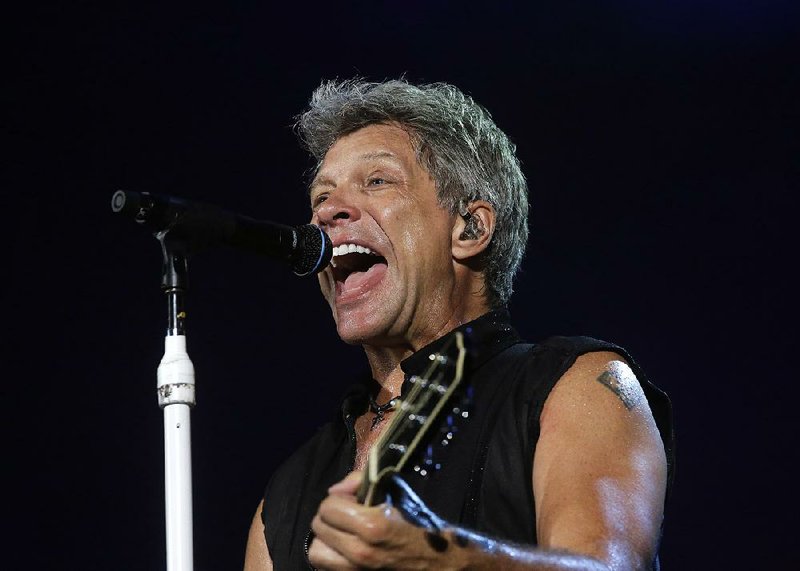 In this Sept. 11, 2015 file photo, Bon Jovi's lead singer Jon Bon Jovi performs during their "Bon Jovi Live!" concert at Gelora Bung Karno Stadium in Jakarta, Indonesia, on their Asia tour.  