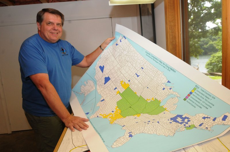 Doug Melton of Bella Vista keeps detailed information about his adventures hiking to the highest point in several states and hundreds of counties. He shows a map, which indicates he has hiked to the highest point of every county in seven states including Arkansas, Missouri, Oklahoma and Kansas.
