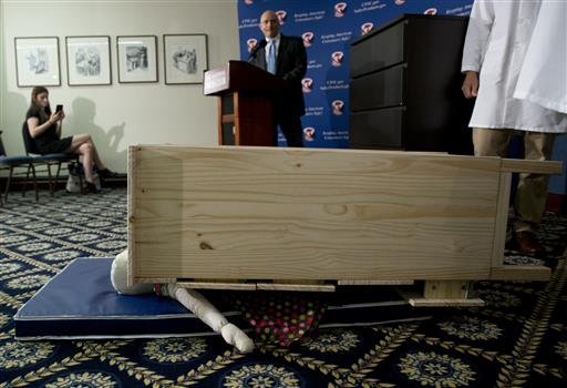 Consumer Product Safety Commission Chairman Elliot Kaye watches during a demonstration of how an Ikea dresser can tip and fall on a child during a news conference at the National Press Club in Washington on Tuesday, June 28, 2016. 