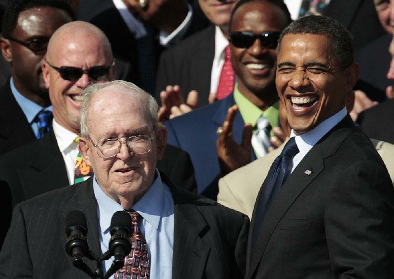 Former NFL coach Buddy Ryan, shown above with President Barack Obama during a 2011 ceremony honoring the 1985 Chicago Bears, died Tuesday. 