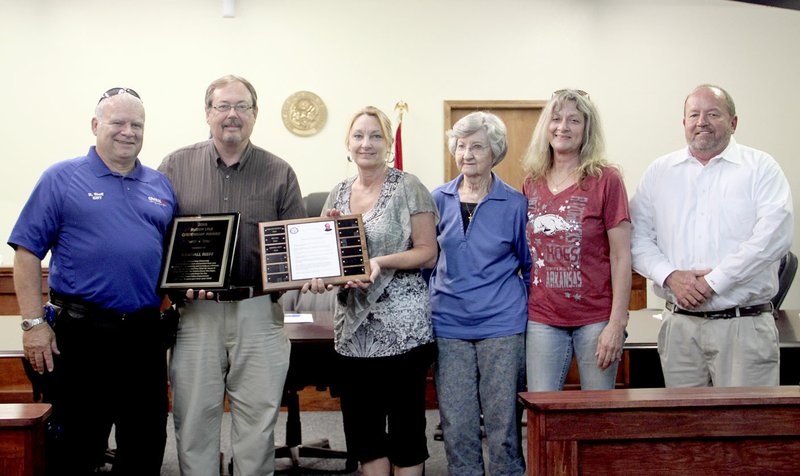 LYNN KUTTER ENTERPRISE-LEADER Randall Rieff of Prairie Grove, left, received the 2016 Buddy Lyle Citizenship Award last week from the city of Prairie Grove. Standing with him are Mayor Sonny Hudson, Council member Gina Lyle-Bailey, Pat Lyle, Lesa Lyle Bement and Brian Bailey.