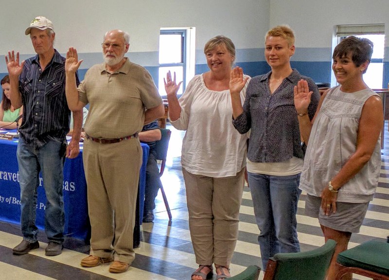 Photo by Patrick Hall New Gravette planning commission members were sworn in by the mayor at the city council meeting last Monday. Planning commission members, shown here, are Dean Edmondson, left, Jeff Davis, Patti Bertschy, Ashley Harris and Shannon Mitchell.