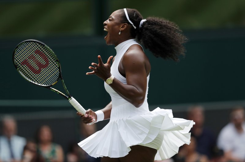 The Associated Press QUEEN AND HER COURT: Defending champion Serena Williams celebrates a point against Switzerland's Amra Sadikovic in the American's 6-2, 6-4 victory Tuesday on the second day of the Wimbledon tennis championships.