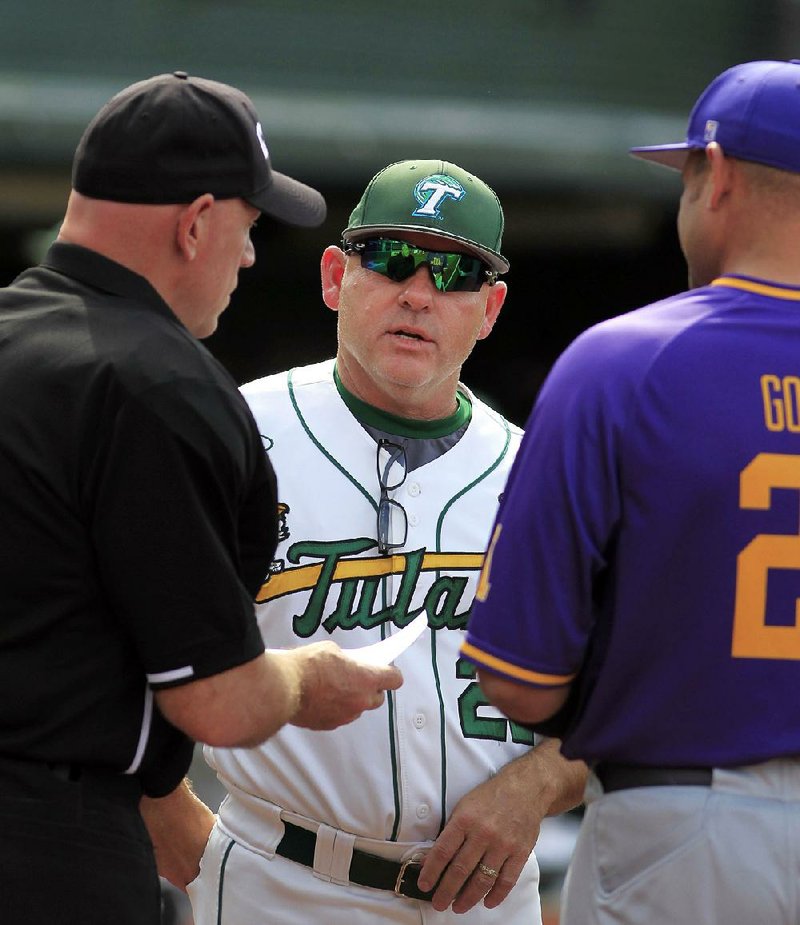 New Texas baseball Coach David Pierce (center)has an overall record of 197-109 as head coach at Sam Houston State and at Tulane, where he led the Green Wave to the American Athletic Conference regular-season championship this season.