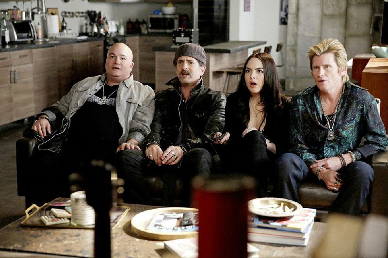 Sex&Drugs&Rock&Roll returns to FX at 9 p.m. today. The series stars (from left) Robert Kelly, John Ales, Elizabeth Gillies and creator Denis Leary.

