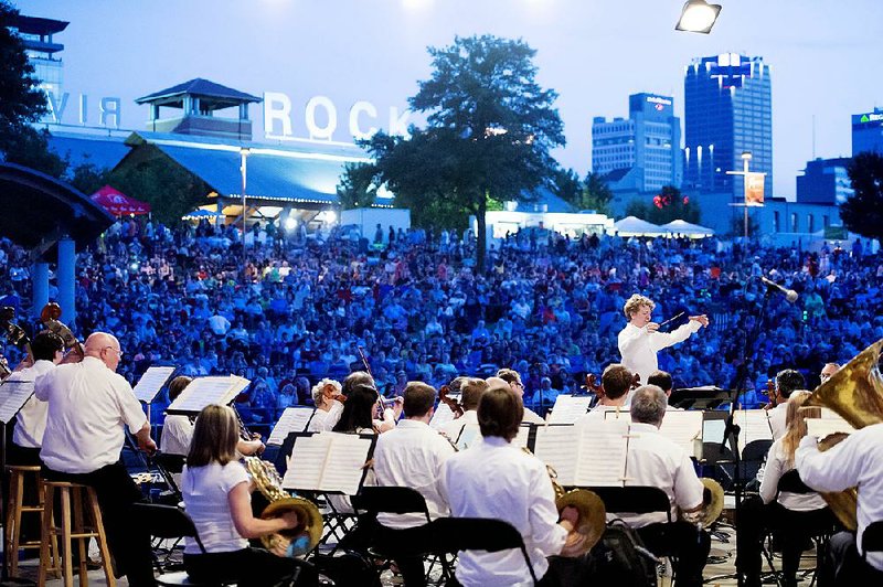 Philip Mann conducts the Arkansas Symphony Orchestra for the Pops on the River finale.