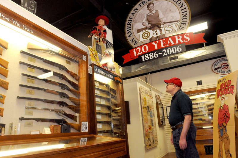 Paul Judd of St. Paul tours the Daisy Airgun Museum on Wednesday in downtown Rogers. Hundreds of target shooters and their families will be in Rogers this weekend for the National BB Gun Championship Match in Rogers.
