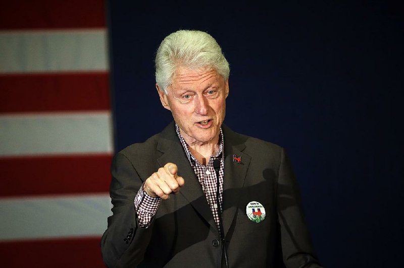 In this photo taken May 5, 2016, former President Bill Clint speaks in Portland, Ore. while campaigning for his wife, Democratic presidential candidate Hillary Clinton. 