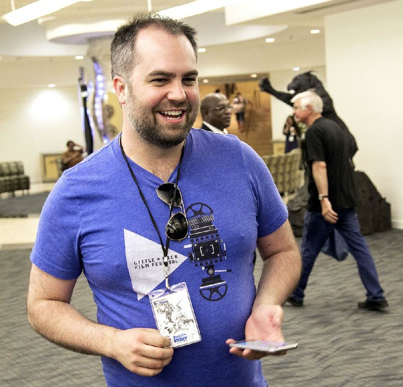 Little Rock Picture Show organizer Justin Nickels juggled many duties — with his smartphone always handy — during the June 11-12 festival held at the Statehouse Convention Center.