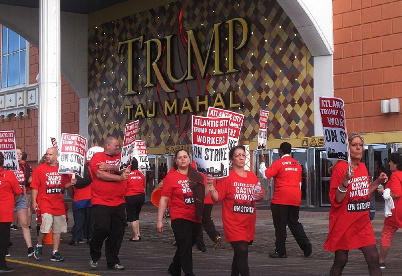 Union members picket Friday outside the Trump Taj Mahal casino in Atlantic City, N.J., moments after they began a strike there. 