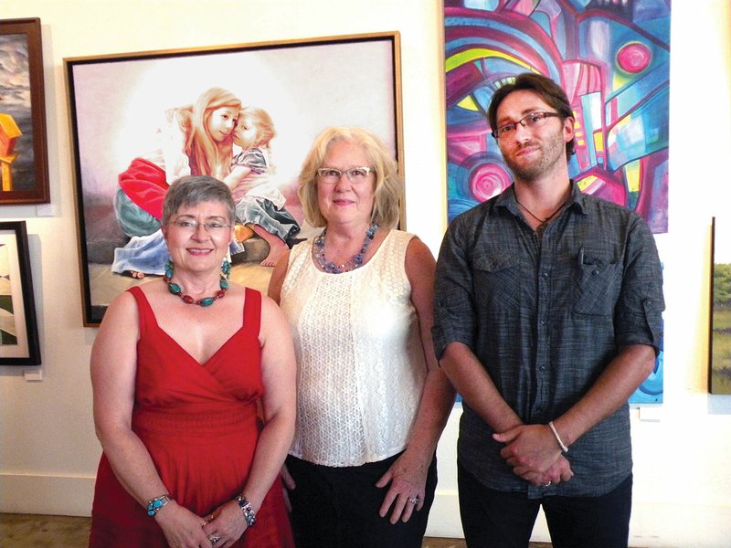 Area artists displaying their works in the Delta des Refusés exhibit at the Thea Foundation in North Little Rock include, from left, DebiLynn Fendley of Arkadelphia, Beverly Buys of Hot Springs and Stewart Fuell of Sheridan.