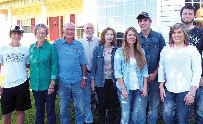Joy and Tommy Sorrells of Royal, second and third from left, celebrate their Garland County Farm Family of the Year honor with family members Weston Dobyns, far left; Richard Sorrells, fourth from left; Julia Sorrells, Andrea Wicker, Carson Wicker, Lauren Wilson and Chevy Wilson.