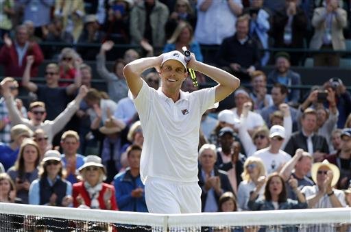 Sam Querrey of the U.S celebrates after beating Novak Djokovic of Serbia in their men's singles match on day six of the Wimbledon Tennis Championships in London on Saturday.
