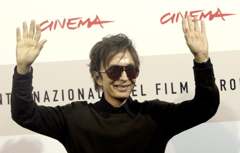 In this Oct. 28, 2008 file photo, director Michael Cimino arrives at the third edition of the Rome Film Festival, in Rome. Cimino, whose film "The Deer Hunter" became one of the great triumphs of Hollywood's 1970s heyday, and whose disastrous "Heaven's Gate" helped bring that era to a close, has died. 