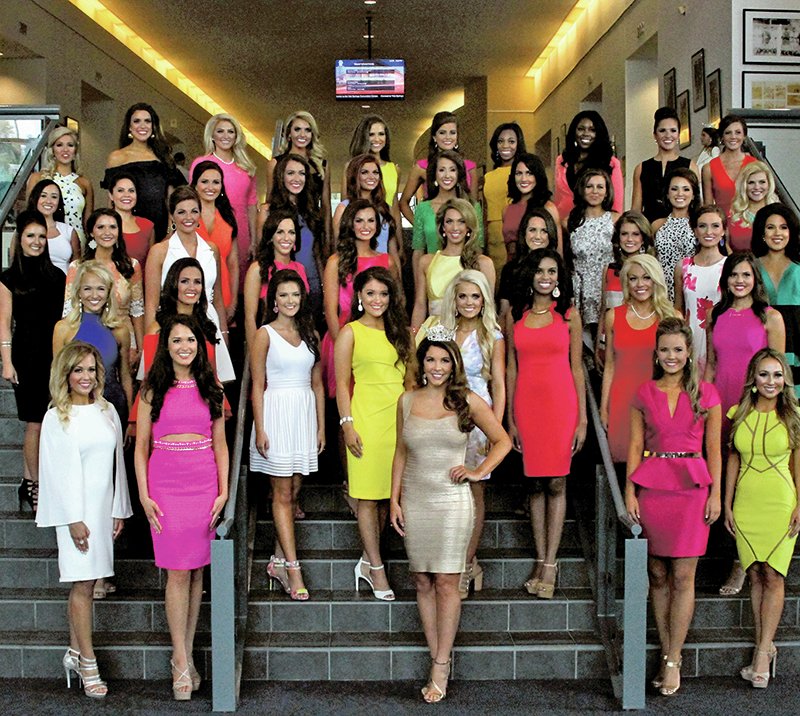 The Sentinel-Record/Max Bryan CONTESTANTS ARRIVE: The 2016 Miss Arkansas Scholarship Pageant contestants gather for a photograph with Miss Arkansas 2015 Loren McDaniel on the main staircase of the Grand Lobby of the Hot Springs Convention Center Sunday afternoon.