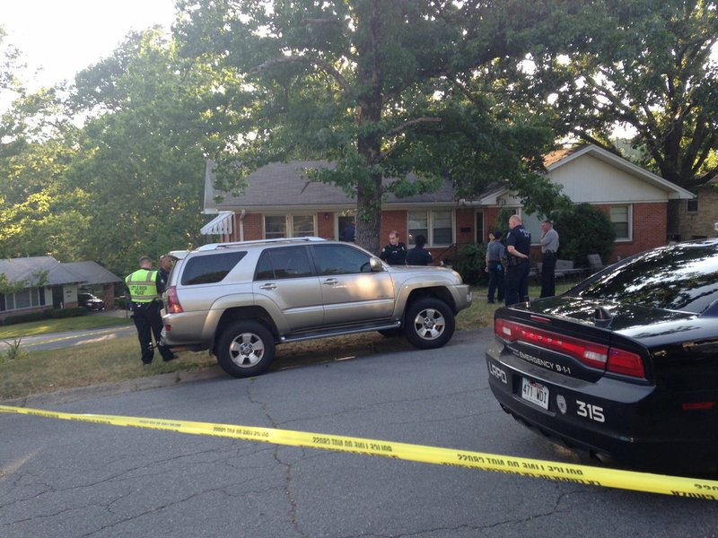 Police investigate a fatal shooting on Blackwood Road in Little Rock on July 4, 2016.