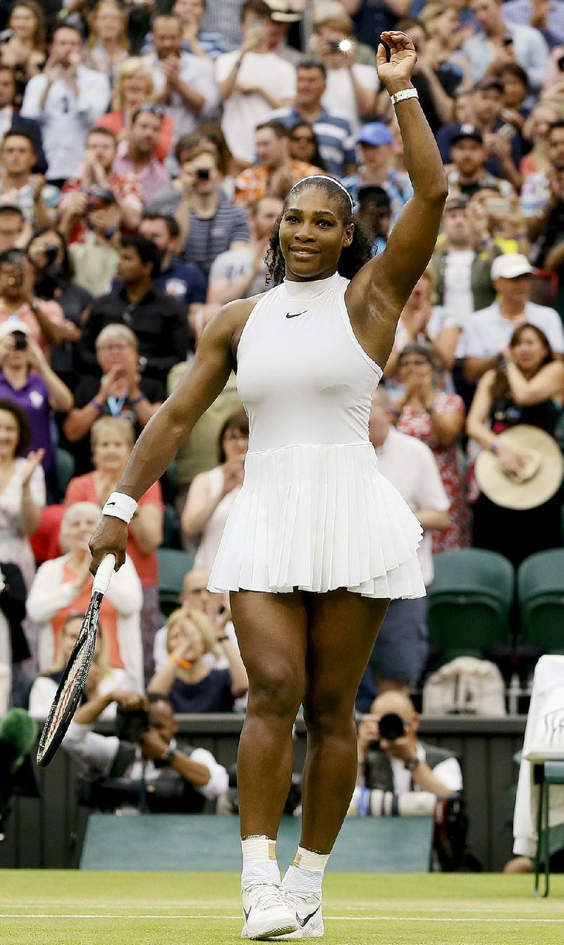 Serena Williams of the U.S celebrates after beating Svetlana Kuznetsova of Russia in their women's singles match on day eight of the Wimbledon Tennis Championships in London, Monday, July 4, 2016. 