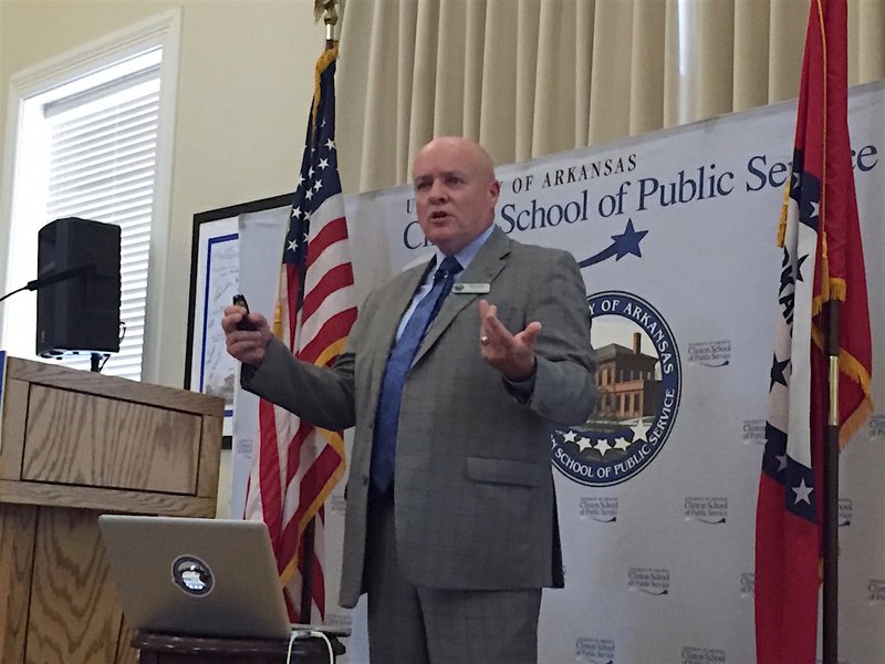 Little Rock Superintendent Michael Poore speaks Tuesday, July 5, 2016, to local education, business and political figures at the Clinton School of Public Service.