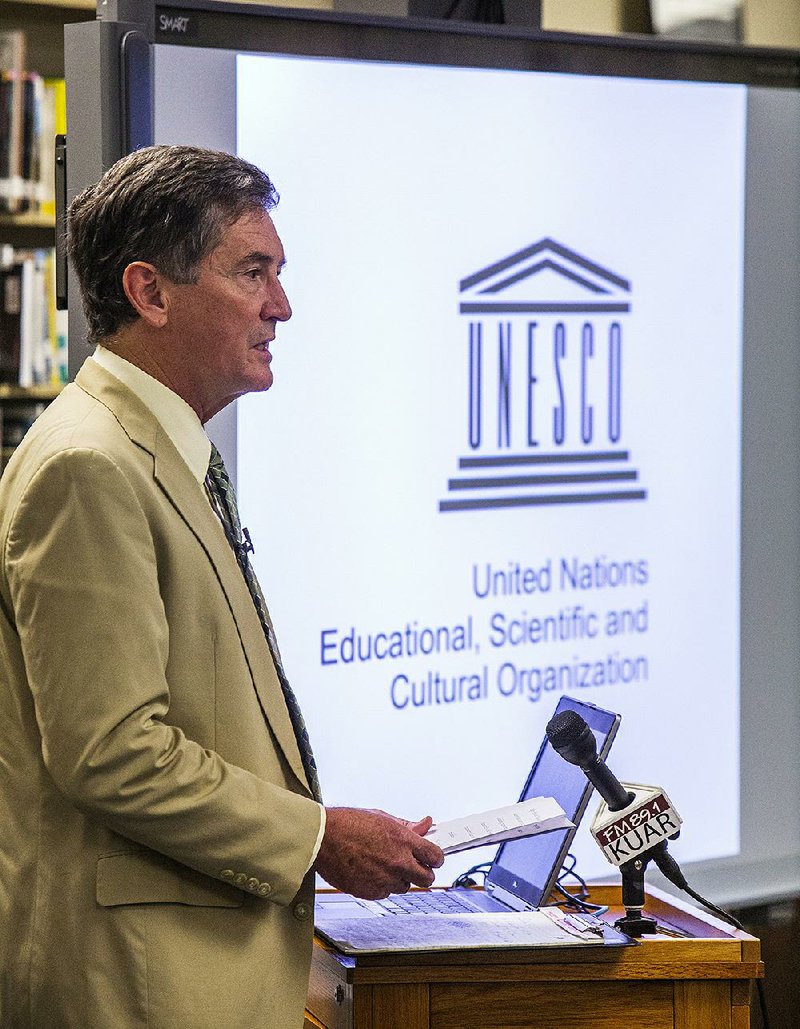 Joe David Rice, tourism director with the Arkansas Department of Parks and Tourism, speaks during a news conference Tuesday about the efforts by Little Rock Central High School National Historic Site, along with other Southern civil-rights landmarks, to seek status as a UNESCO World Heritage site.