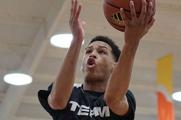 Khalil Garland of Team Penny goes for a layup during their game Saturday during the Real Deal in the Rock at P.A.R.K. in Little Rock on Saturday, April 2, 2016. 