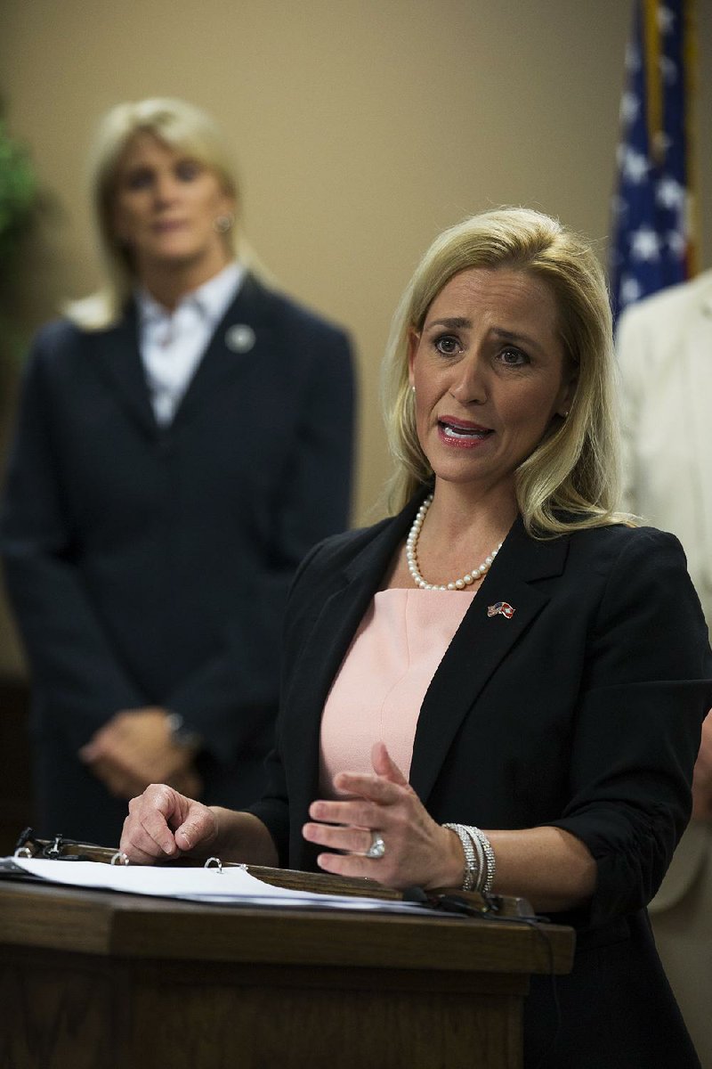 Arkansas Democrat-Gazette/MELISSA SUE GERRITS - 07/06/16 - Attorney General Leslie Rutledge speaks to media and other interested parties during a press conference July 6, 2016 to announce the creation of a new website to aid in Arkansas' missing persons search. Neverforgotten.ar.gov is a database that will include all missing persons from Arkansas and will be updated regularly. 