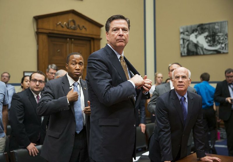 FBI Director James Comey concludes his testimony Thursday before a House committee where he stood by his recommendation not to charge Hillary Clinton over her email setup as secretary of state.