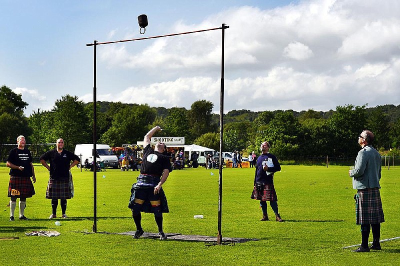Many Highland Games events in Scotland feature robust competitors hurling massive weights, such as tossing a weight over a 10-foot-high bar using only one hand. 