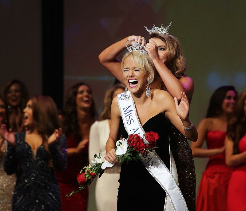 Miss Heart of the Ozarks Savvy Shields is crowned Miss Arkansas 2016 on Saturday night in Hot Springs. Shields, 21, of Fayetteville, was chosen from a field of 11 finalists. 