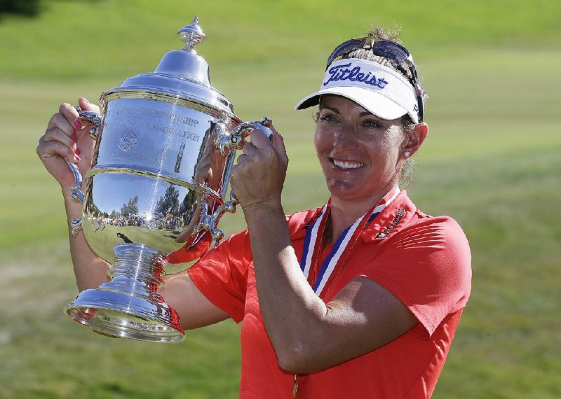 Brittany Lang poses with her trophy on the 18th green after winning the U.S. Women's Open golf tournament at CordeValle, Sunday, July 10, 2016, in San Martin, Calif. 