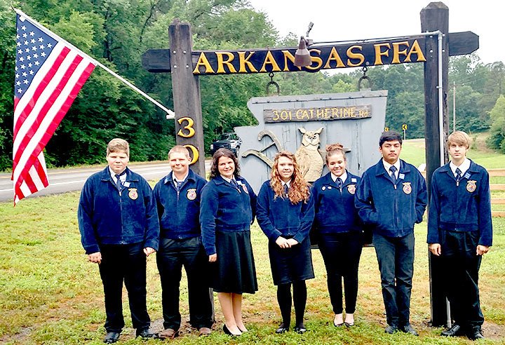 Submitted Photo Members of the Decatur Future Farmers of America chapter pose for a picture near the entrance to Camp Couchdale, on Lake Catherine near Hot Springs, on June 1. Camp Couchdale was the site of the 2016 Arkansas State FFA Convention. Members of the Decatur team included Wyatt Day (left), Corley Day, Paige Barrett, Kara Gregory, Alisun Watson, Marck Guardaramma and Bracy Owens.