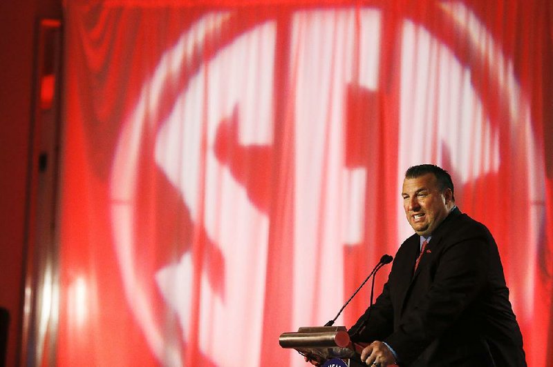 Arkansas coach Bret Bielema speaks to the media at the Southeastern Conference NCAA college football media days, Wednesday, July 13, 2016, in Hoover, Ala. (AP Photo/Brynn Anderson)